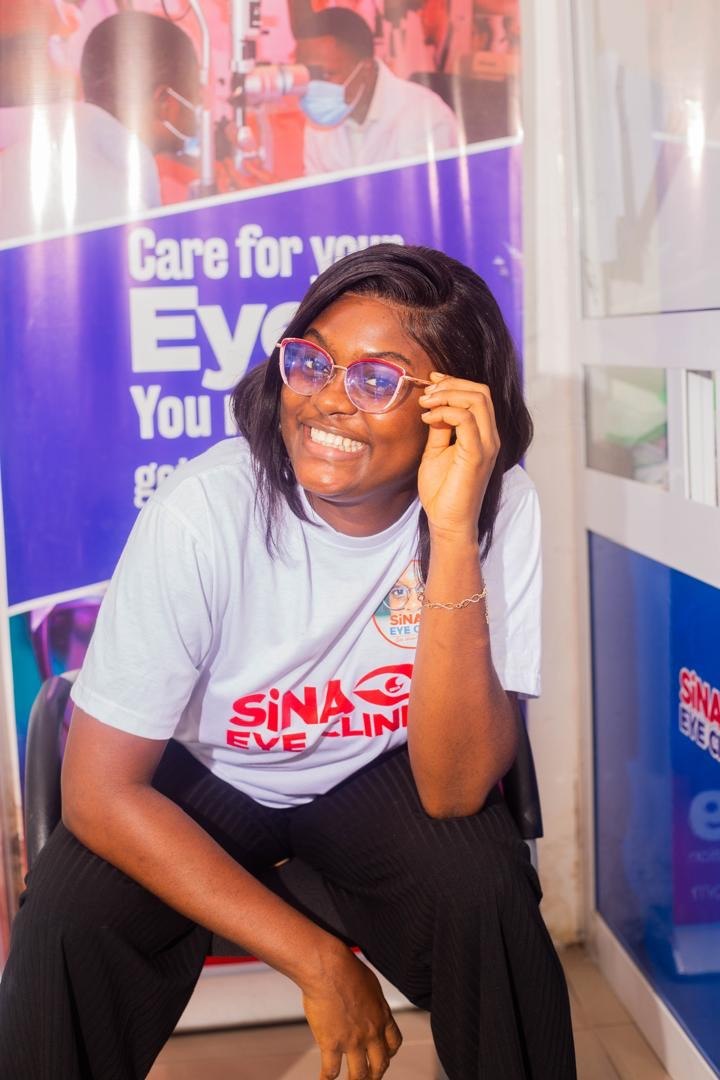 SiNA staff member with glasses